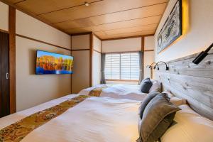 Ένα ή περισσότερα κρεβάτια σε δωμάτιο στο 函館大手町高田屋