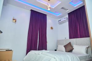 Ένα ή περισσότερα κρεβάτια σε δωμάτιο στο The Nook Apartments +6 φωτογραφίες