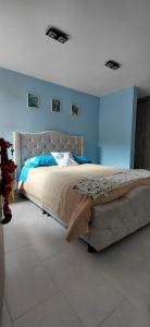 Giường trong phòng chung tại Apt zona turisitica Lago Sochagota