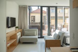 TV a/nebo společenská místnost v ubytování I Loft Porto