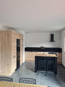 Η κουζίνα ή μικρή κουζίνα στο Maison neuve à 20 minde Lille +7 φωτογραφίες