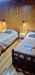 Postel nebo postele na pokoji v ubytování CabañaMS