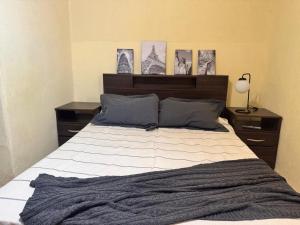 Ένα ή περισσότερα κρεβάτια σε δωμάτιο στο Habitación baño privado externo casa 6 ambientes inmejorable ubicación