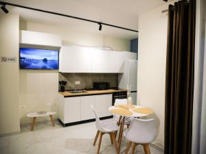 Kuchyň nebo kuchyňský kout v ubytování HORIZONT Central Stay Apart-Hotel