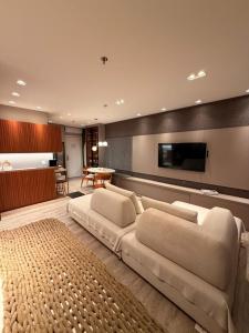 Kuchyň nebo kuchyňský kout v ubytování Seu Refúgio de Luxo a Passos do Mar em Itapema