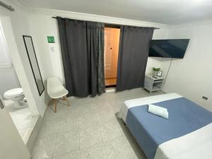 Postel nebo postele na pokoji v ubytování Habitación independiente cerca al aeropuerto 2