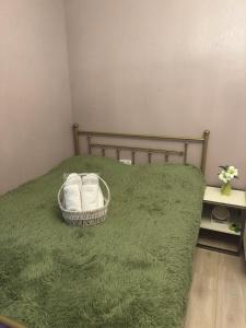 Postel nebo postele na pokoji v ubytování თბილისი + 3 fotografie