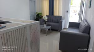 Posezení v ubytování Remanso de Paz + 1 fotografie