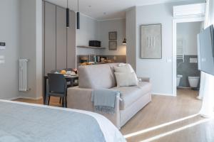 Una cama o camas en una habitación de Olive chic Suite CentroBergamo