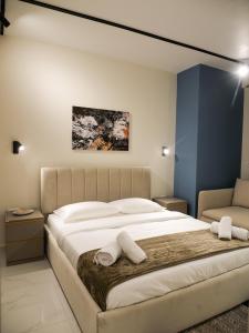 Postel nebo postele na pokoji v ubytování HORIZONT Central Stay Apart-Hotel