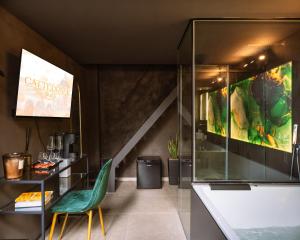 Televiisor ja/või meelelahutuskeskus majutusasutuses Cattedrale Suite