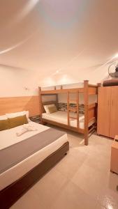 Postel nebo postele na pokoji v ubytování Hotel MOVA