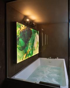 Televiisor ja/või meelelahutuskeskus majutusasutuses Cattedrale Suite +35 fotot