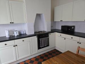 Η κουζίνα ή μικρή κουζίνα στο Place Like Home