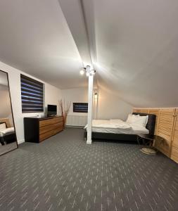 Ένα ή περισσότερα κρεβάτια σε δωμάτιο στο ContaApart