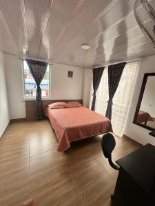 Giường trong phòng chung tại La Casa de Oliva