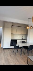 Kuchyň nebo kuchyňský kout v ubytování JAN Apartment