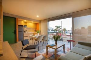 O bucătărie sau chicinetă la Loft en Edificio de Autor cerca de Distrito León MX