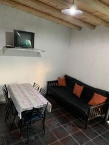 TV a/nebo společenská místnost v ubytování Glorisa