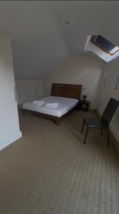 Ένα ή περισσότερα κρεβάτια σε δωμάτιο στο Modern Spacious 4 Bedroom house in St John's Wood +1 φωτογραφίες