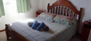 Ένα ή περισσότερα κρεβάτια σε δωμάτιο στο Casa on the rock's