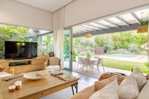 Et tv og/eller underholdning på Amanecer en Chacras