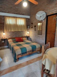 Ένα ή περισσότερα κρεβάτια σε δωμάτιο στο Cabañas del IntiCo