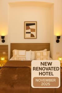 Ліжко або ліжка в номері Hotel Aurelia Milano Centrale