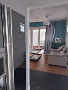 Un lugar para sentarse en Oranga Comfort Stay