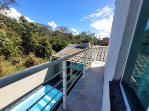 Μπαλκόνι ή βεράντα στο Praia de Leste Sobrado com piscina