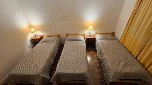 Ένα ή περισσότερα κρεβάτια σε δωμάτιο στο Complejo La Soñada