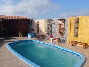 Bazén v ubytování Chalé cantinho do ceu nebo v jeho okolí + 6 fotografií