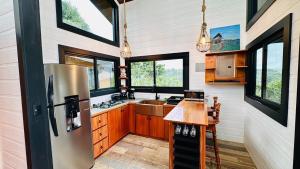 Kuchyň nebo kuchyňský kout v ubytování Paraiso Terrenal Chalet