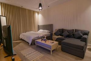 Ένα ή περισσότερα κρεβάτια σε δωμάτιο στο ميامي هوستيل