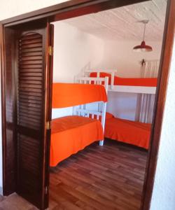 Ένα ή περισσότερα κρεβάτια σε δωμάτιο στο Luna