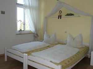 Ένα ή περισσότερα κρεβάτια σε δωμάτιο στο 1 Norit Schlosser