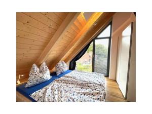 Postel nebo postele na pokoji v ubytování Käthe Am Wariner See