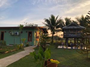 Κήπος έξω από το สมายด์ ฮ่อมนา เรสเฮาท์ Smile Homna Resthouse