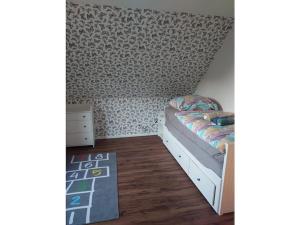 Postel nebo postele na pokoji v ubytování Tinla Comfortable Holiday Residence