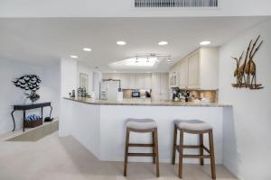 Kuchyň nebo kuchyňský kout v ubytování Beachcomber A101