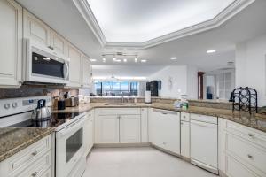 Kuchyň nebo kuchyňský kout v ubytování Beachcomber A101