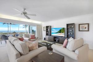 TV a/nebo společenská místnost v ubytování Beachcomber A101 + 33 fotografií