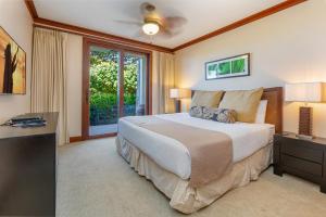 Ένα ή περισσότερα κρεβάτια σε δωμάτιο στο Popular Ground Floor with Extra Grassy Area - Beach Tower at Ko Olina Beach Villas Resort +33 φωτογραφίες