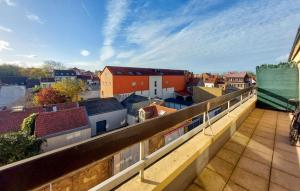 a view of a city from a balcony at Cozy Apartment In Dunkerque in Dunkerque +26 photos