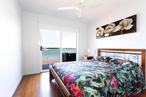 Ένα ή περισσότερα κρεβάτια σε δωμάτιο στο Omaroo