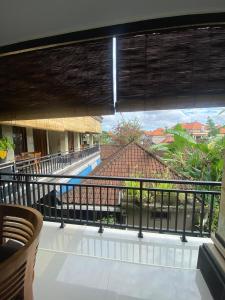 Balkón nebo terasa v ubytování Rumah Ary Homestay & Spa + 75 fotografií