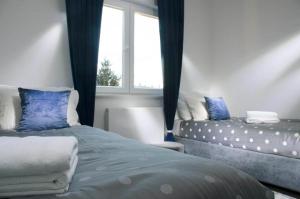 Postel nebo postele na pokoji v ubytování Apartments with parking space Zagreb - 24973