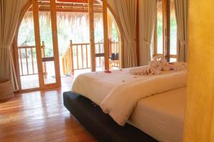 Ένα ή περισσότερα κρεβάτια σε δωμάτιο στο The Good House