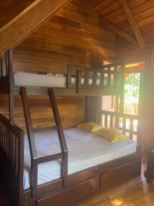 Ένα ή περισσότερα κρεβάτια σε δωμάτιο στο Casa Carao Peninsula de Nicoya - front beach