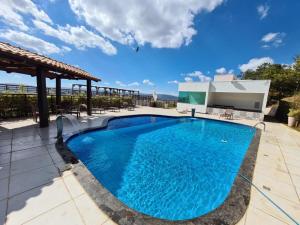 Πισίνα στο ή κοντά στο Refúgio Escarpas do Lago Mirante 1702